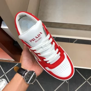 PRADA DOWNTOWN LEATHER SNEAKERS IN WHITE AND LACQUER RED- PRD012