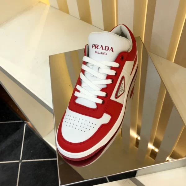 PRADA DOWNTOWN LEATHER SNEAKERS IN WHITE AND LACQUER RED- PRD012