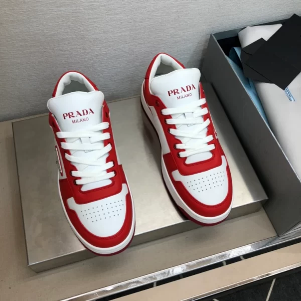 PRADA DOWNTOWN LEATHER SNEAKERS IN WHITE AND LACQUER RED- PRD012