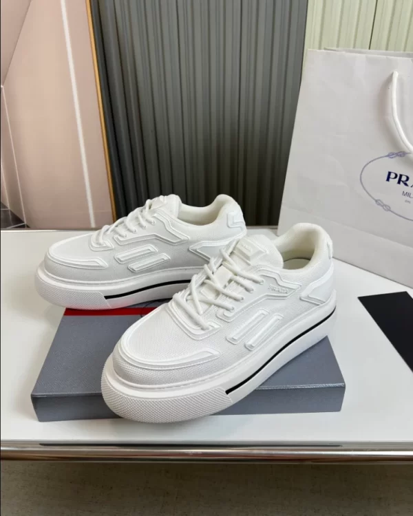 PRADA MACRO RE-NYLON AND BRUSHED LEATHER SNEAKERS - PRD061