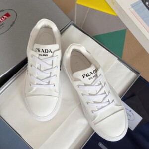 PRADA MACRO RE-NYLON AND BRUSHED LEATHER SNEAKERS - PRD064