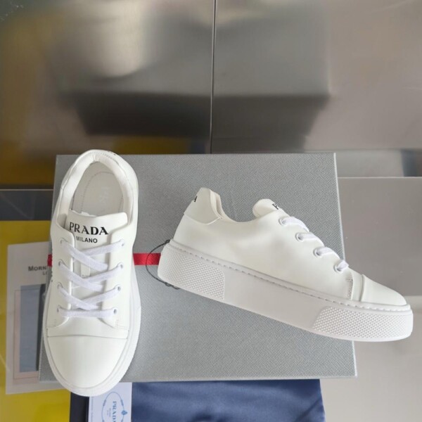 PRADA MACRO RE-NYLON AND BRUSHED LEATHER SNEAKERS - PRD064