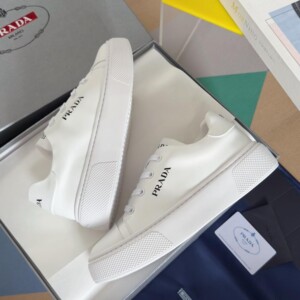 PRADA MACRO RE-NYLON AND BRUSHED LEATHER SNEAKERS - PRD064