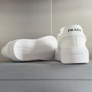 PRADA MACRO RE-NYLON AND BRUSHED LEATHER SNEAKERS - PRD064