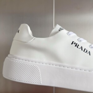 PRADA MACRO RE-NYLON AND BRUSHED LEATHER SNEAKERS - PRD064