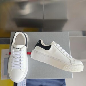 PRADA MACRO RE-NYLON AND BRUSHED LEATHER SNEAKERS - PRD065